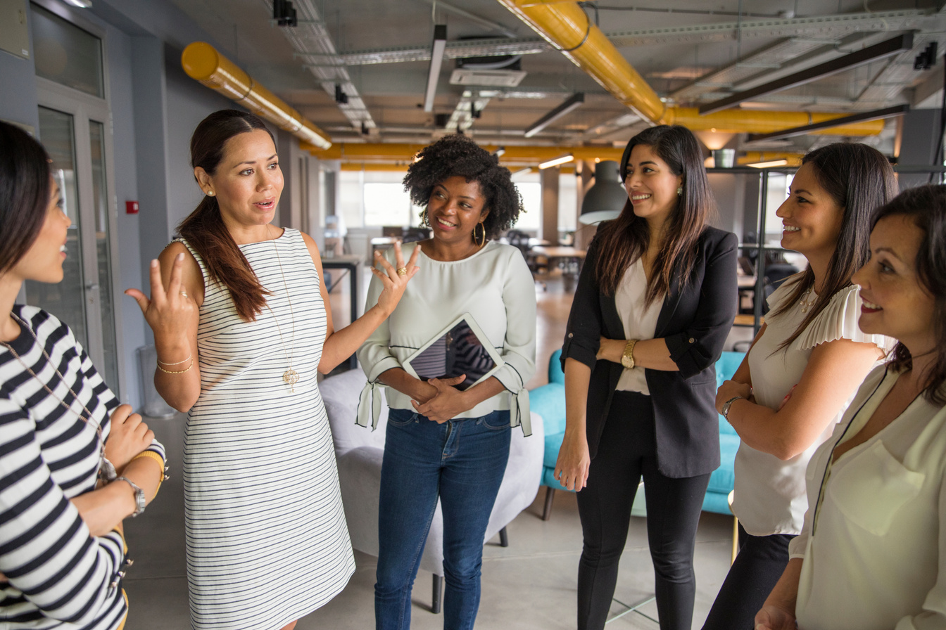 Group of women having informal conversation